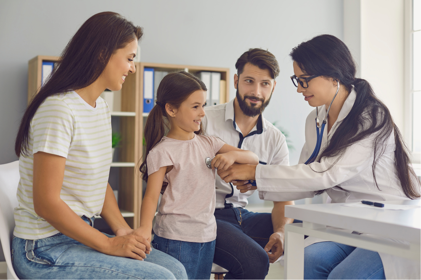 A family visiting a doctor for a health checkup